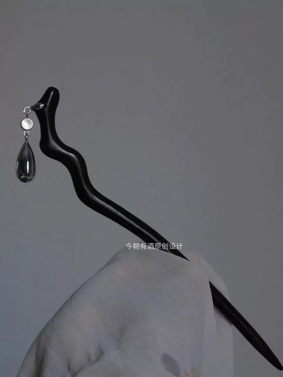 Ebony Hair Stick: Condensation