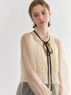 Sheer Lace-Trimmed Blouse with Ribbon Tie